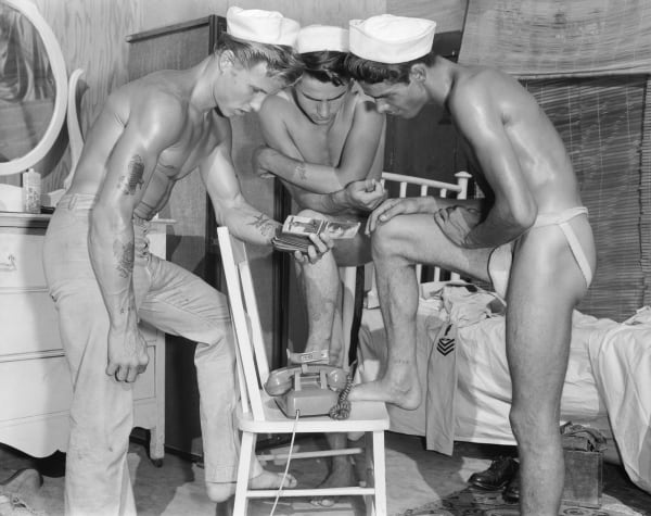 Bob Mizer, Robert Rex, Michael Dunn, and Bill Poole (with wallet), Los Angeles, 1959