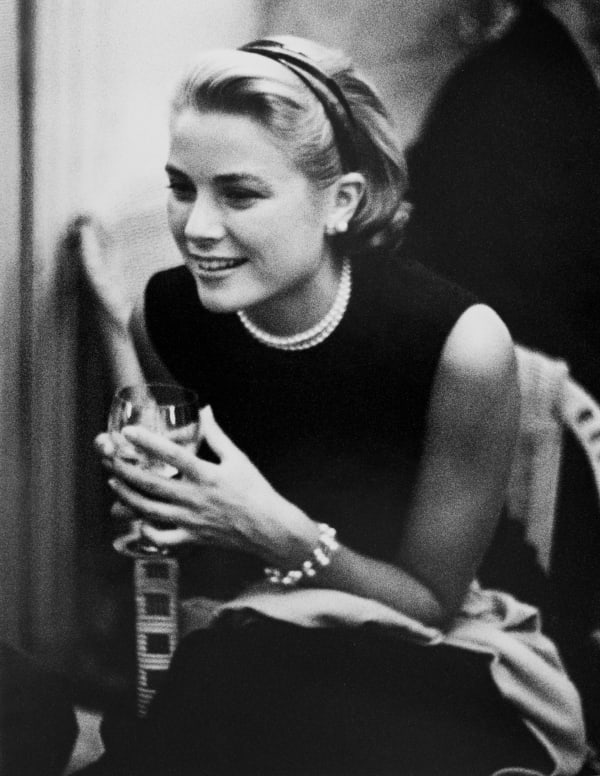 Edward Quinn, Grace Kelly during a press cocktail party at the Carlton Hotel, 1954