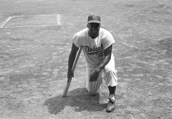 Neil Leifer, Portrait of Jackie Robinson of the Brooklyn Dodgers posing during Camera Day at Ebbets Field. Brooklyn, New York, 1956