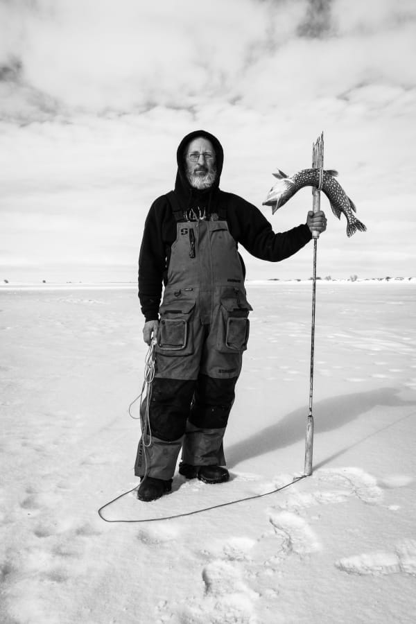 Richard Sharum, Ice Fisherman with Fresh Northern Pike. Hemand, North Dakota, 2022