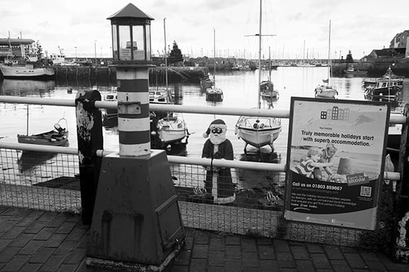Roger A. Deakins, Santa in the Harbor, Brixham, 2022
