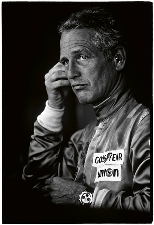 Al Satterwhite, American actor Paul Newman photographed during a 12-hour race where he was co-driving a Porsche 911S with Bill Freeman, at Sebring raceway in Florida, USA, 1977