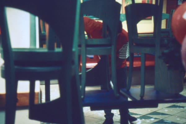 Louis Stettner, Red Man Sweeping, Porte de Clichy, 1998, printed 1998