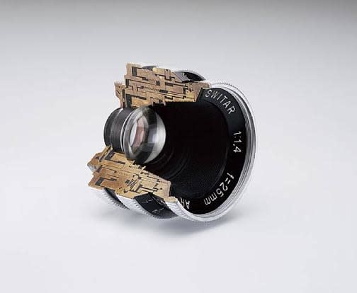 Cutaway model Switar 25mm f1.4 AR. Glass, wood and brass. Photography by the Douglas M. Parker Studio, Glendale, California, November 2007