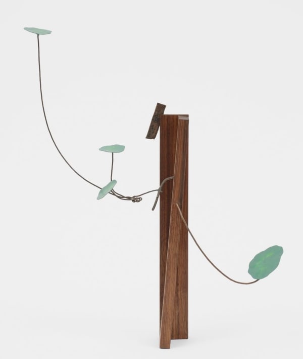 Conrad Guevara, Ear shrapnel with nasturtium, 2022