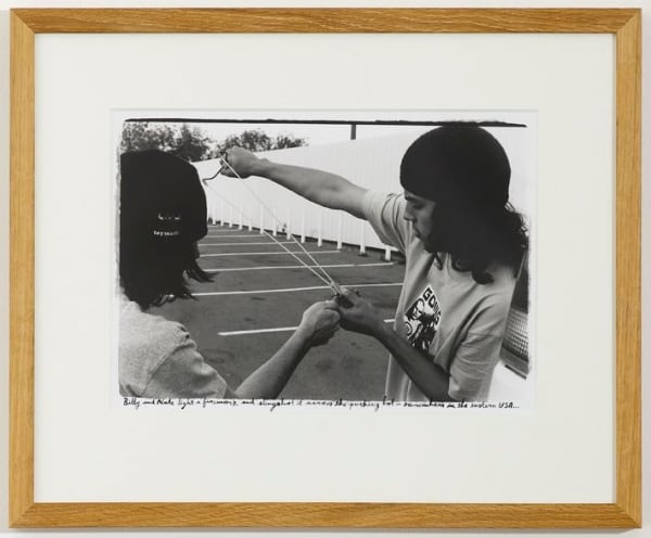 Ed Templeton Billy + Nate shoot a firework, 2008 Black and white photograph with text