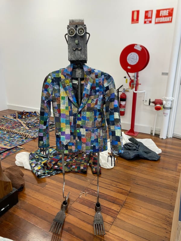 Jordan Gogos Self Portrait; That Would Be The Best Part(s), 2024 sculpture: mild steal, hardened steal, galvanised steal, aluminium & metal paint blazer: mixed media, cotton, polyester, hessianwith Greek & Australian made acrylic, metallic & fabric paints