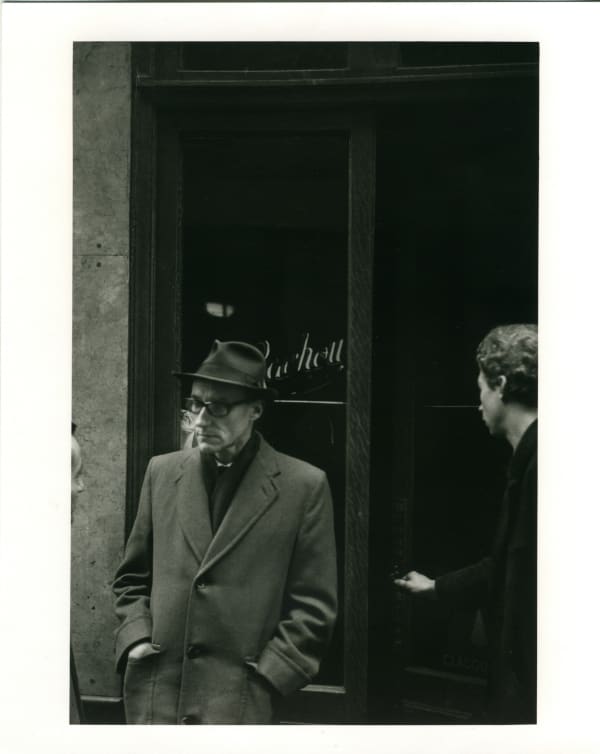 Brion Gysin, William Burroughs in front of the Beat Hotel, Paris, sign: Mme Rachou, proprietress (Naked Lunch Launch series, Paris, October 1959), 1959