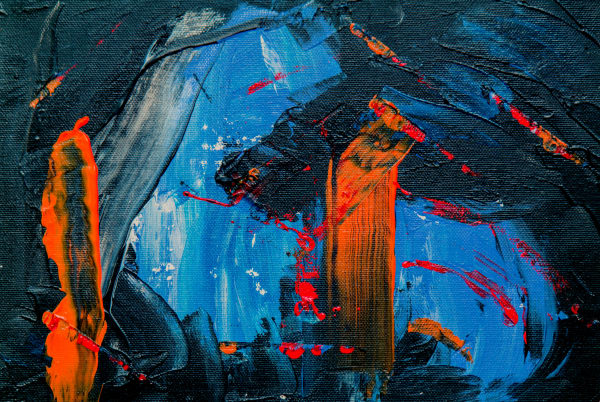 splashes of red, blue, black paint