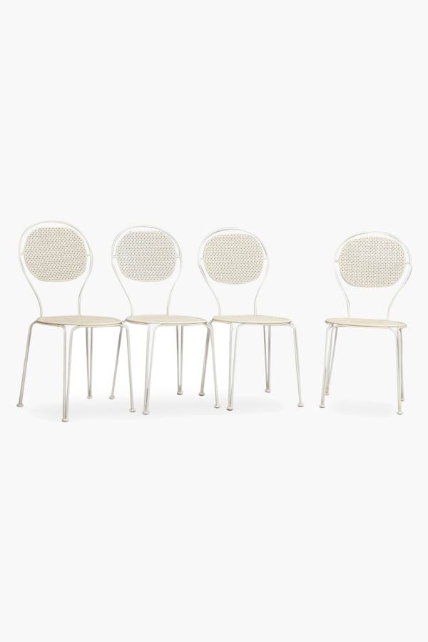Four Pierced Metal Chairs in the style of Mathieu Matégot