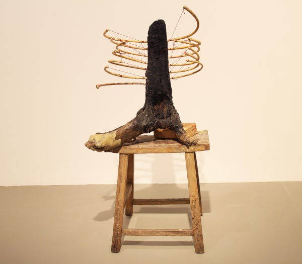 Zai Kuning Sitting on a throne which is not there, 2014 Mixed media (wax, wood, rattan, books, stool) H105 x 62 x 50 cm