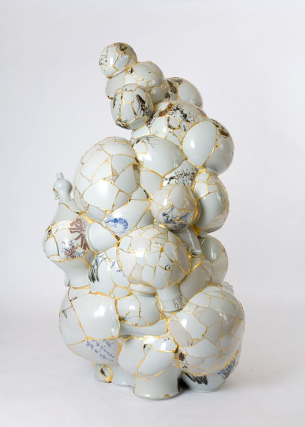 Yeesookyung Translated Vase, 2009 Ceramic shards, epoxy, 24k gold leaf 92 x 95 x H160 cm