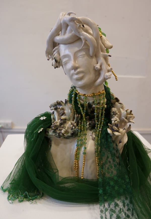 Soe Yu Nwe Medusa, 2022 Glazed ceramics, oxides, cone 6, sequins, crystals, plastic beads, fabric from Mya Nan Nwe Temple offering, wire 38.1 x 25.4 x 33 cm