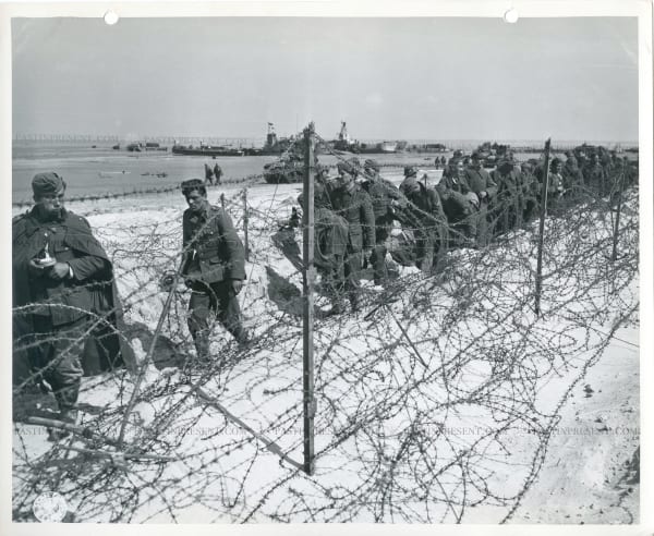 D-Day Allied Normandy landing Captured Wehrmacht POW’s waiting to be transported to England, France 6.8.1944, 1944