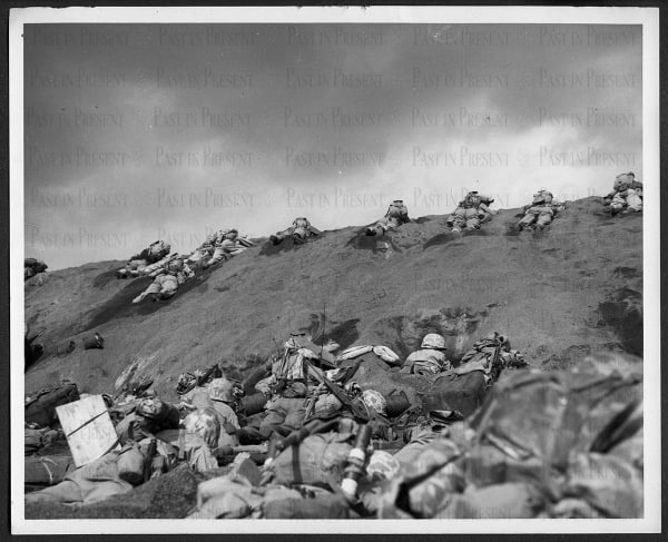 Dreyfuss, “Bloody, Inch By Inch” Fifth Division Marines crawling under heavy fire on Red Beach #1 toward Suribachi, Iwo Jima, February 19th, 1945., 1945