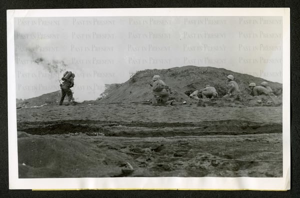 U.S. Marine Corps, "Last Stand" A Die-Hard Jap On Iwo Jima gets a blast of liquid flame. Marines Advance On Jap Dugout 2/27/45, 1945
