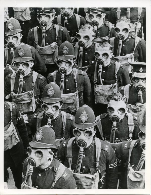 International News Photo, “London Prepares for the Unthinkable: Gas-Masked Policemen on the Eve of War”, 1939., 1939