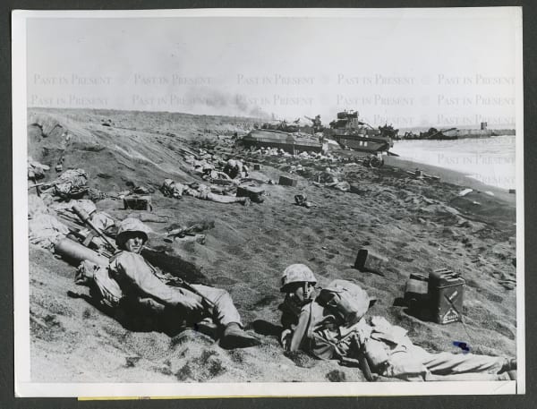 Joe Rosenthal, “Blistering Jap Fire Pins Marines on Iwo Jima Beach.” 22 February 1945., 1945