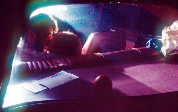 David Burnett, Couple inside car, 1969