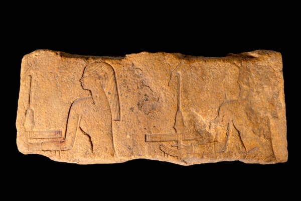 Egyptian Red Quartzite Stele with Carvings of Two Worshippers, Egyptian Red Quartzite Stele with Carvings of Two Worshippers, Circa 1550 - 1069BC