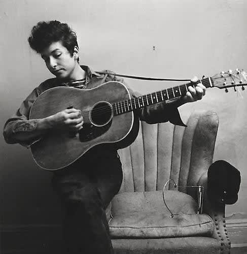 Don Hunstein, Bob Dylan, New York Apartment [Holding Guitar], February 1963