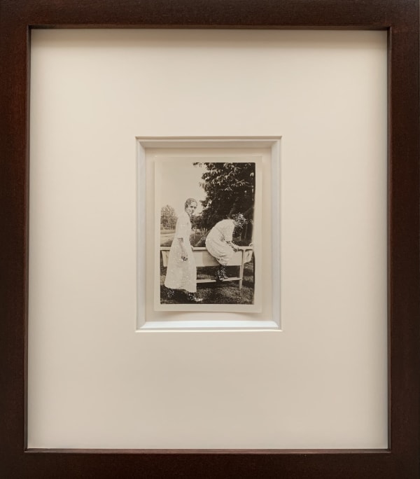 John Latour, Two Women in White Dresses and Black Boots, One Climbs over a Curious Structure, 2021