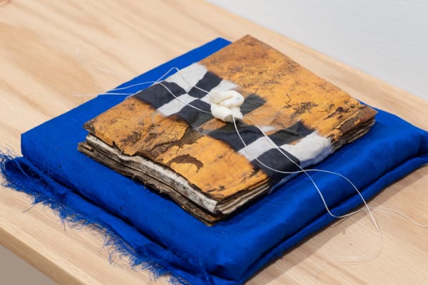 Apotropaia (ii), 2023 Soie antique, coton, cire, époxy, papier, poussière de corne de chevreuil Antique silk, cotton fiber, wax, copper leaf, epoxy, paper, deer horn dust Jamie Ross 1 1/2 x 11 x 8 " 3.8 x 27.9 x 20.3 cm