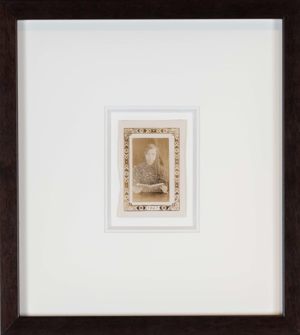John Latour, Young adolescent girl with long curls and locket with an open book in her hands, 2015