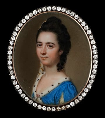 John Smart, Portrait miniature of a Lady, identified as ‘Miss Byron’, in ermine-trimmed blue dress slashed at the sleeves and fastened with a jewel at the centre, her hair worn upswept and decorated with embroidered silk gauze, 1770