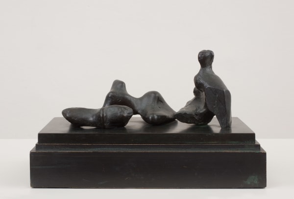 Bronze sculpture of a reclining woman by Henry Moore
