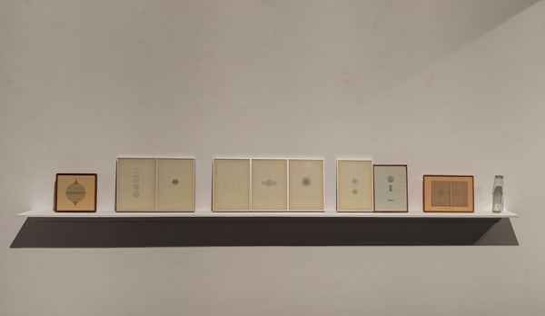 Shreyas Karle Anti-Gravity, 2012 Seven prints on paper; two glasses with water Variable