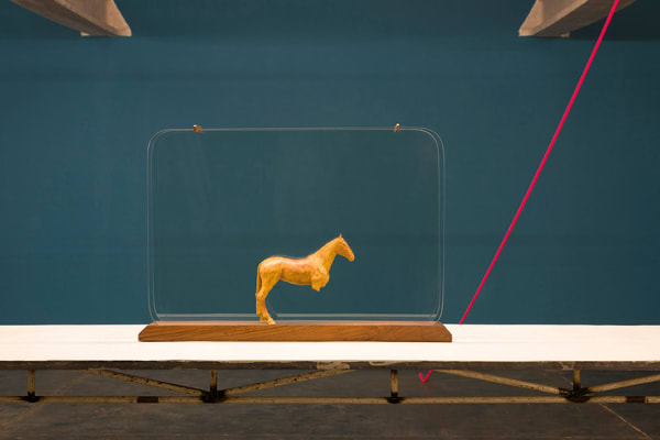 Shreyas Karle Performing under pressure in the museum of broken objects, 2018 Museum glass, broken terracotta horse and wooden stand 27 x 20 x 3 inches