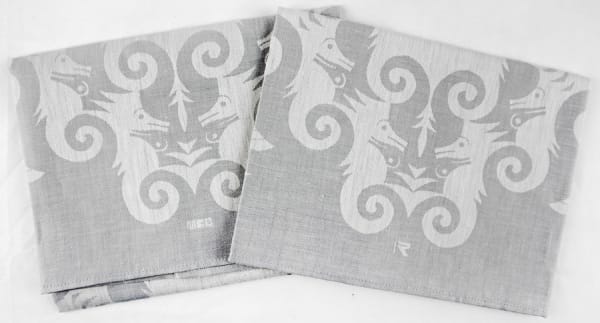 Pair of damask napkins: seahorses and fish. Napkins folded