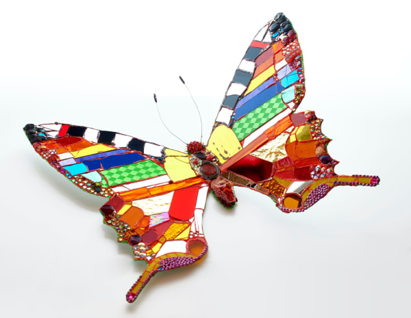 Colorful butterfly sculpted by Andrew Logan available at the Rebecca Hossack Art Gallery.