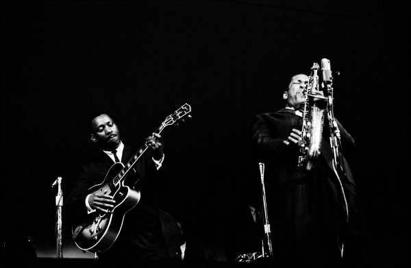 Black and white photograph by Jim Marshall of John Coltrane and Wes Montgomery available at the Rebecca Hossack Art Gallery.