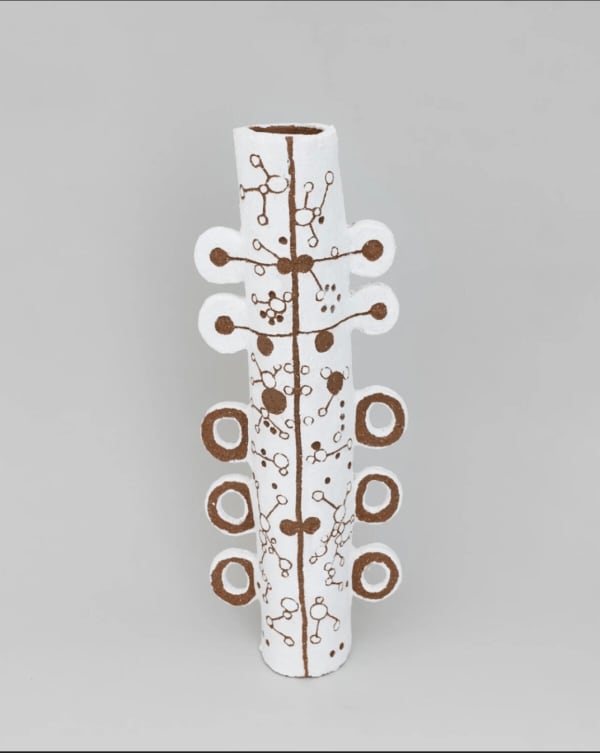 A decorative ceramic Aboriginal pole