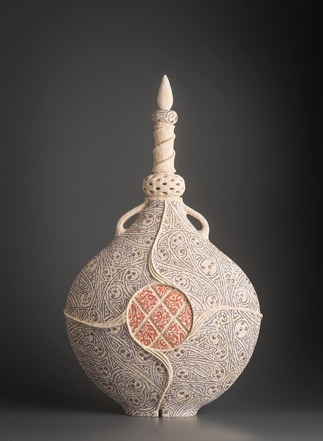 Ceramist Avital Sheffer, from Israel and New South Wales, Australia. Hand built contemporary ceramic artwork with middle eastern influences. Stencilled earthenware with blue and pink details.