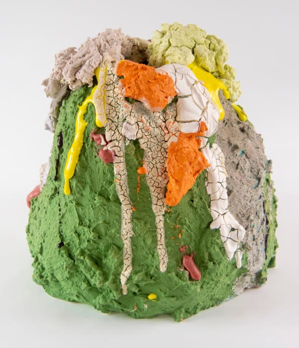 A sculpture of a volcano erupting by artist Reniel Del Rosario.