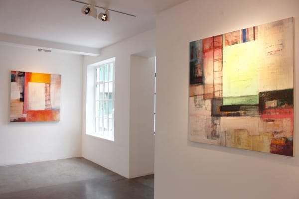 Geometric and abstract works with complex textures and colours by Danish artist Morten Lassen displayed in a room.