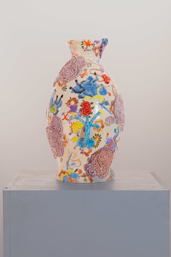 Fons van Laar, Decorative ceramic vase with large pink details and a rose at the centre. There are also images of various flowers and knights on horses around the vase.