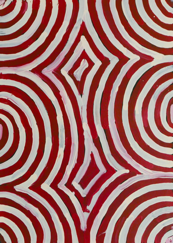 A painting of patterned white and red circles by Aboriginal-Australian artist Gladdy Kemarre entitled Awelye