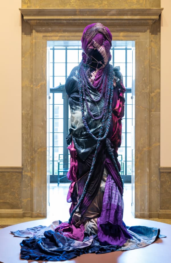 Shinique Smith Grace Stands Beside, 2020 Dyed garments, denim and fabrics, ribbon, rope, foam, and wood 80 x 22 x 24 In