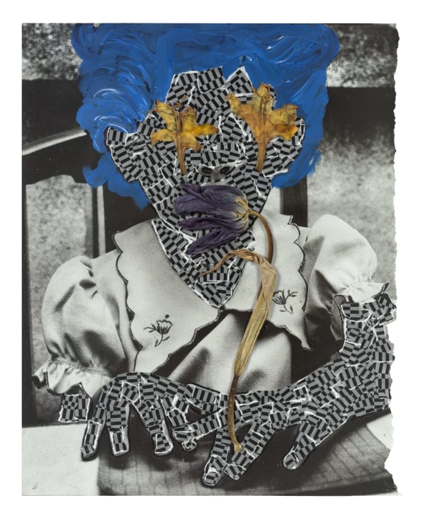 A person with a strange black and white checkered pattern covering their skin, blue hair, yellow star shaped eyes, and holding a dried up flower.