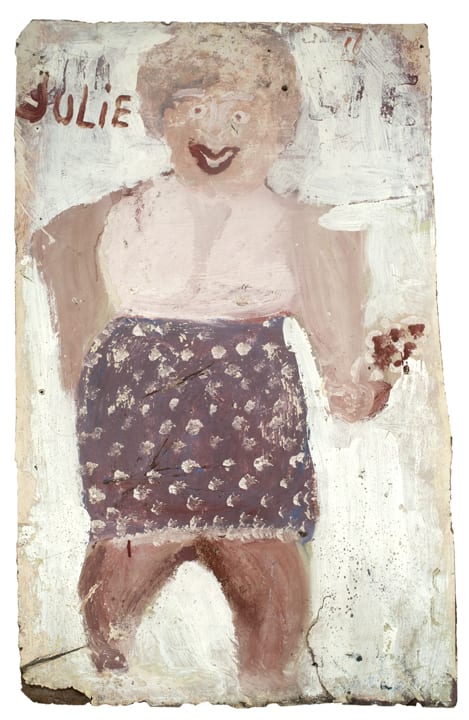 Depiction of a smiling woman wearing a spotted pink and purple skirt. The name "Julie" written next to their head.