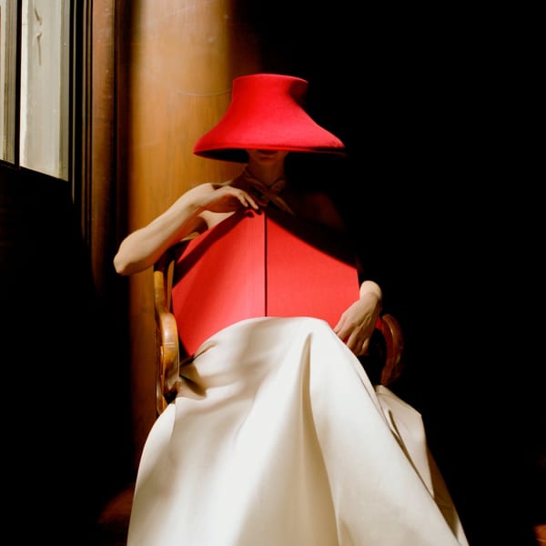 Rodney Smith, Bernadette in Red Hat with Book, New York Public Library, NYC, 2003