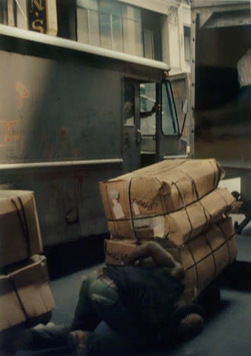 Helen Levitt, Untitled, New York (man with packages), 1972