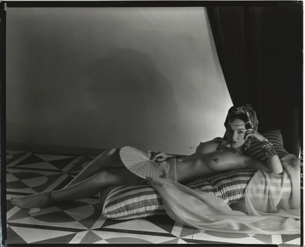 Horst P. Horst, Odalisque (horizontal with fan), 1940/43