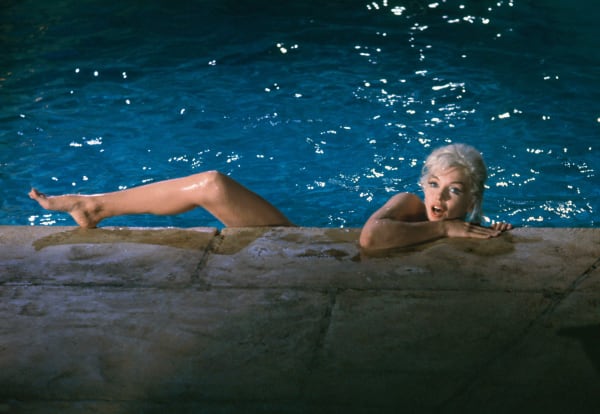 Lawrence Schiller, Marilyn Monroe climbing from pool, 1962