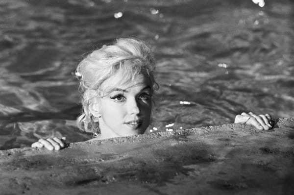 Lawrence Schiller, Marilyn Monroe at pool edge, 1962