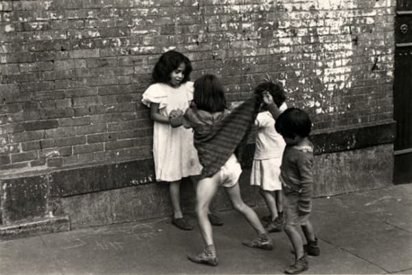 Helen Levitt, Boy Lifting Girl’s Dress, 53, (040-AWOS2), c. 1940